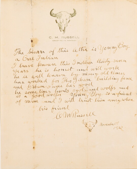 A hand-written letter in brown ink; at the top of the stationery and under the signature are drawings of a cow skull.