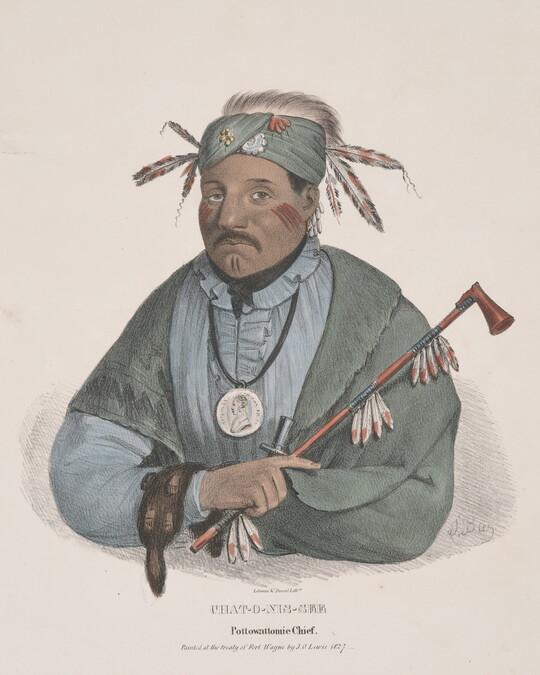 A color print of an Indigenous man wearing a green turban with red and white feathers, red markings on his face, a silver medallion over his blue shirt, green shawl over his shoulders, arms crossed holding a feathered pipe in one hand.