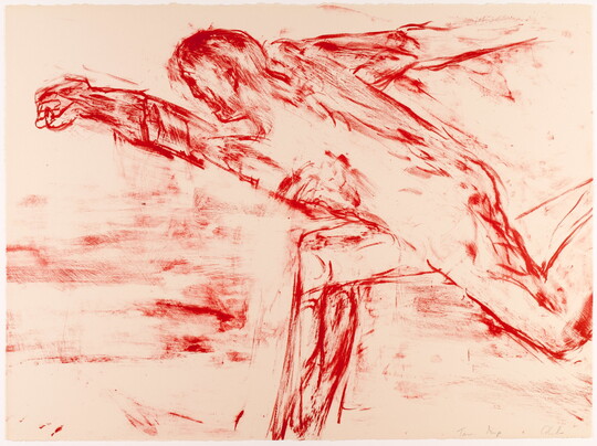 An abstract color print in red of a man running.