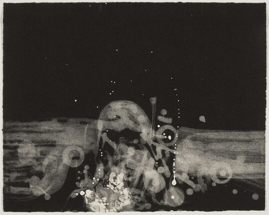 An abstract print of white swirls and dots on the bottom half of the page against a black background.