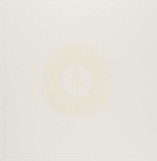 An abstract print of a thick circle enclosing a flower form, both in a faint cream color on white paper.