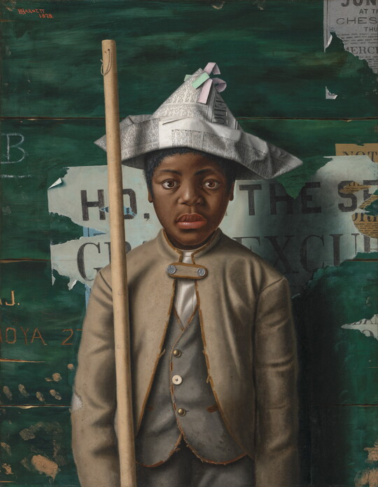 An oil painting of a Black boy wearing a newspaper hat and tattered clothes, resting a wooden pole on his shoulder, and standing against wall with old handbills on it.