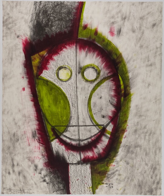 An abstract color print of a head made of simple geometric shapes with highlights of green, red, and yellow.