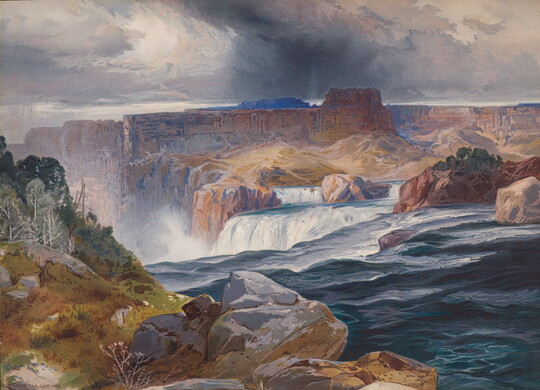 A color print of water flowing into a waterfall surrounded by large red rock formations on a cloudy day.