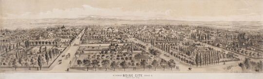 A sepia-toned print of an aerial view of a city showing the city blocks and buildings and mountains in the distance.