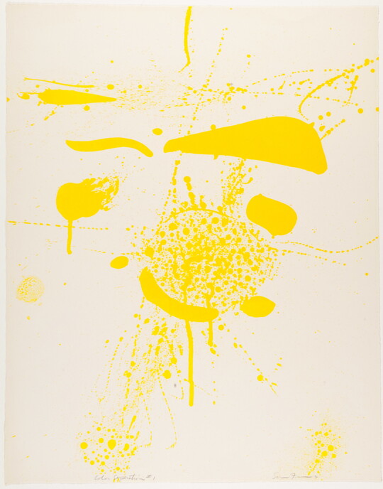 An abstract color print of yellow ink blots, streaks, splatters, and drips primarily at center of sheet.