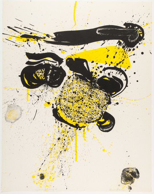 An abstract color print of yellow and black ink blots, streaks, splatters, and drips primarily at center of sheet.