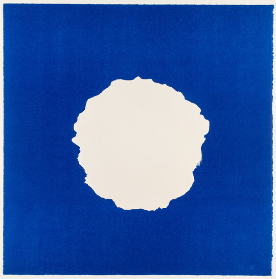 An abstract color print of ragged, white circle on a blue background.