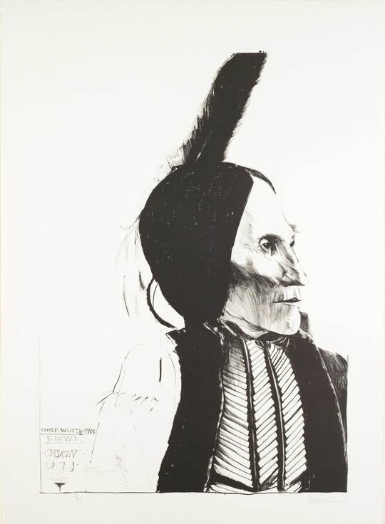 A black-and-white portrait print of an Indigenous person in profile, a feather standing up from their head, wearing a bone breastplate.