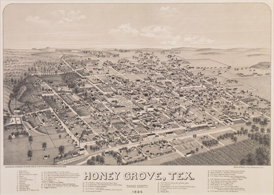A black-and-white print of a bird's eye view of a town showing its grid of streets and a railroad in the foreground.