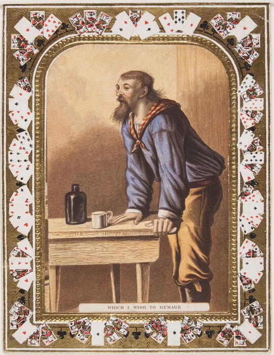 A color print of a White man with a long beard wearing a red and yellow bandanna leaning on a wooden table; playing cards make up the decorative border.