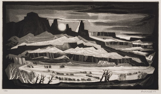A black-and-white print of an abstracted desert landscape with leafless trees in the foreground and the moon showing between black rocky peaks beyond.