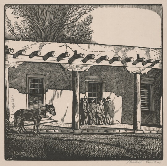 A sepia-toned print of four people standing on the porch of an adobe building, horses pulling a carriage just coming into view.