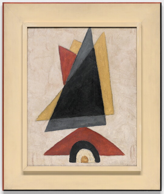 A painting of three layered triangles in blue, red, and yellow above a smaller red triangle that together suggest a sailboat.