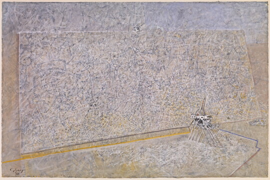 An abstract painting of a large-scale canvas leaning against a wall.