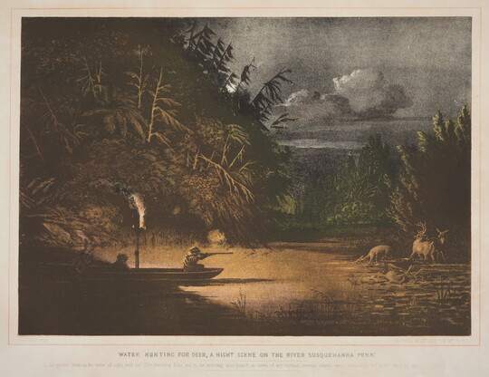 A color print of two people, one pointing a rifle at deer on the shore, in a canoe on calm water at night.