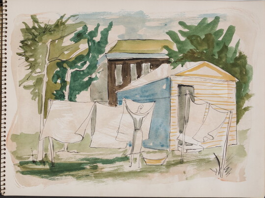 A watercolor drawing of a woman hanging laundry behind a small building on a page of a bound sketchbook.