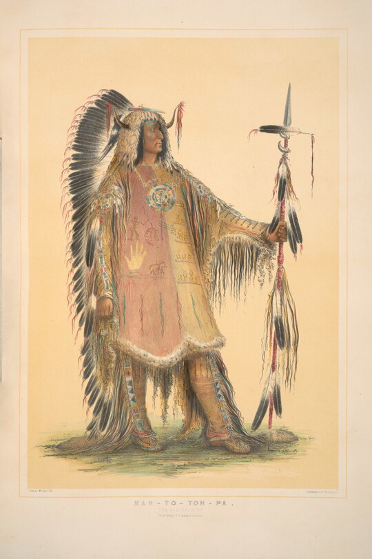 A color print of an Indigenous man dressed in a tunic, full-length headdress, and holding a feathered spear.