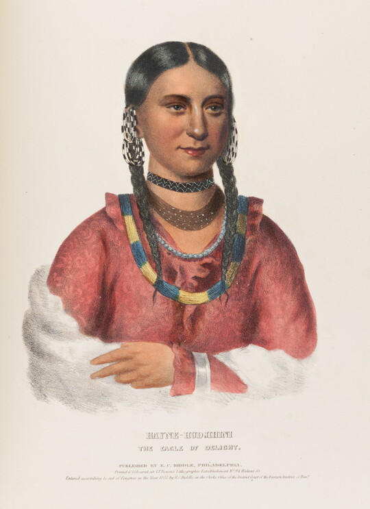 A color print of an Indigenous woman with braids, beaded necklaces, earrings, and a red tunic.