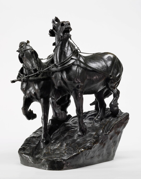 A bronze sculpture of two horses wearing harnesses running side by side.