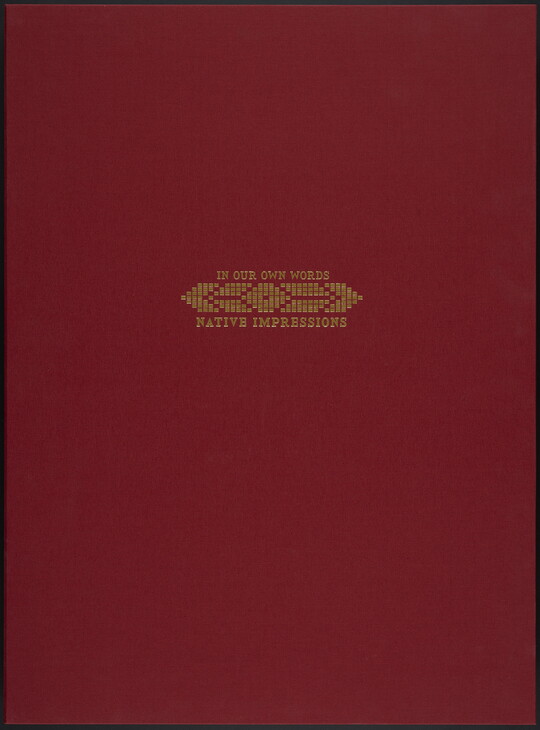 A red cloth box with the words, "In our own words, Native Impressions" stamped in gold letters.