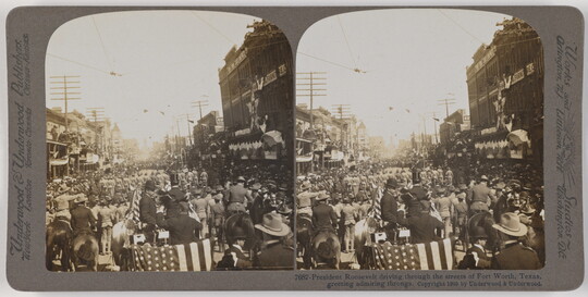 Two almost identical side-by-side black-and-white photographs of a parade of people, including several in a car waving to large crowds.