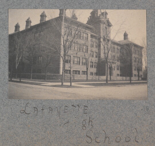 A black-and-white photograph of a four-story high brick building labeled "Lafayette High School."