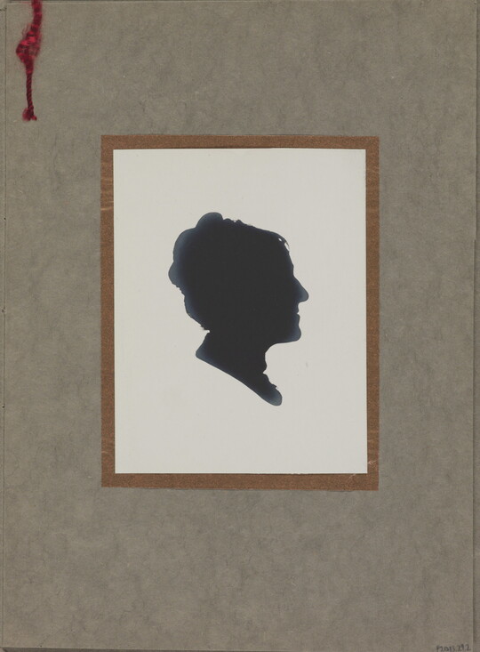 A black silhouette print of a woman's head, shown in profile, on a white background.