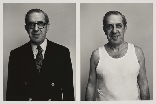 Two side-by-side black-and-white photographs of a White man in the same pose: on the left, in a nice suit and glasses, and on the right in an undershirt and no glasses.