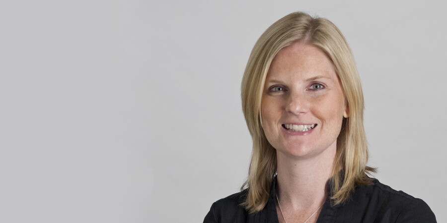 Headshot of Tracy Greene.