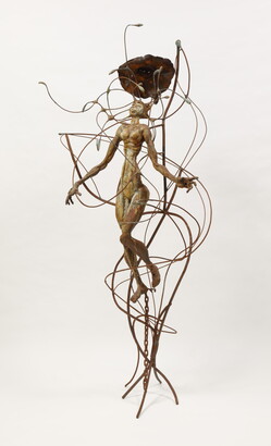 A nude human figure with a chain dangling from one foot floats in a swirl of wires.