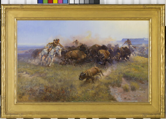 A dynamic painting of Native American men on horseback hunting a herd of bison.