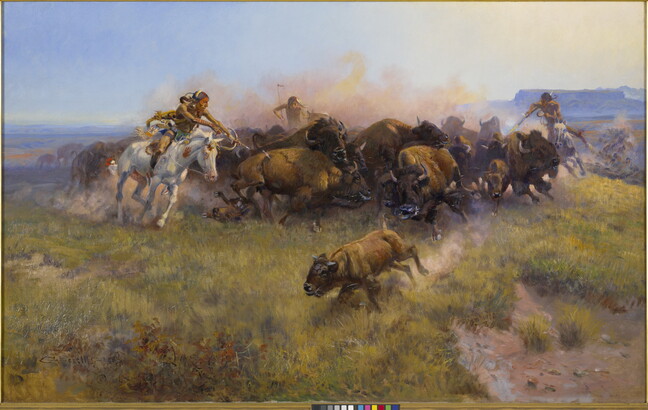 A dynamic painting of Native American men on horseback hunting a herd of bison.