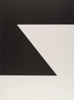 A black-and-white print of a zig-zag geometric design.