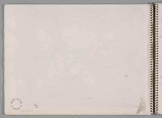 An abstract watercolor of sepia-toned splatters on a page of a bound sketchbook.