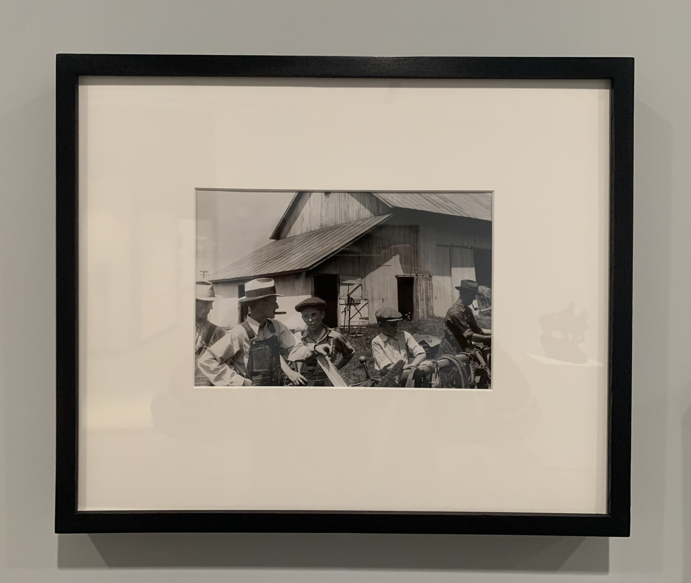 A black-and-white photograph displayed under a white mat in a black frame.