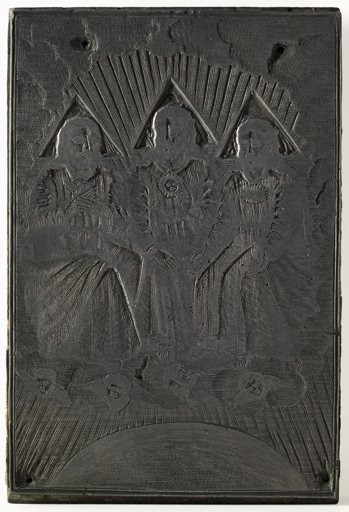 An engraved metal printing plate of three seated male figures draped in robes seated on thrones on a cloud.