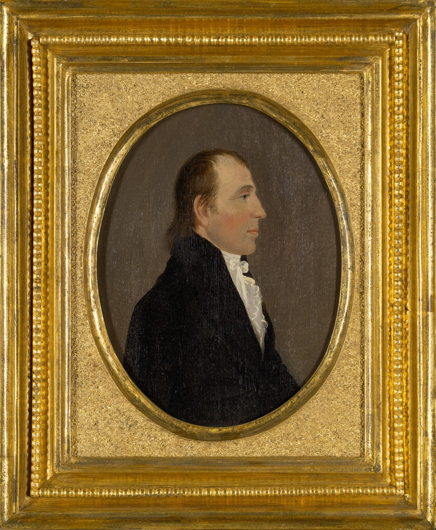 An oil painting portrait of a balding White man in profile wearing a white ruffled shirt under a black coat.