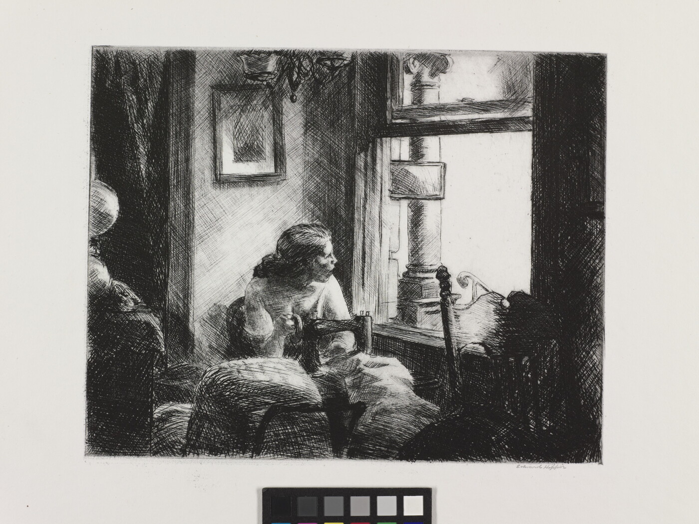 A black-and-white etching of a woman sitting at a sewing machine, looking out a window.