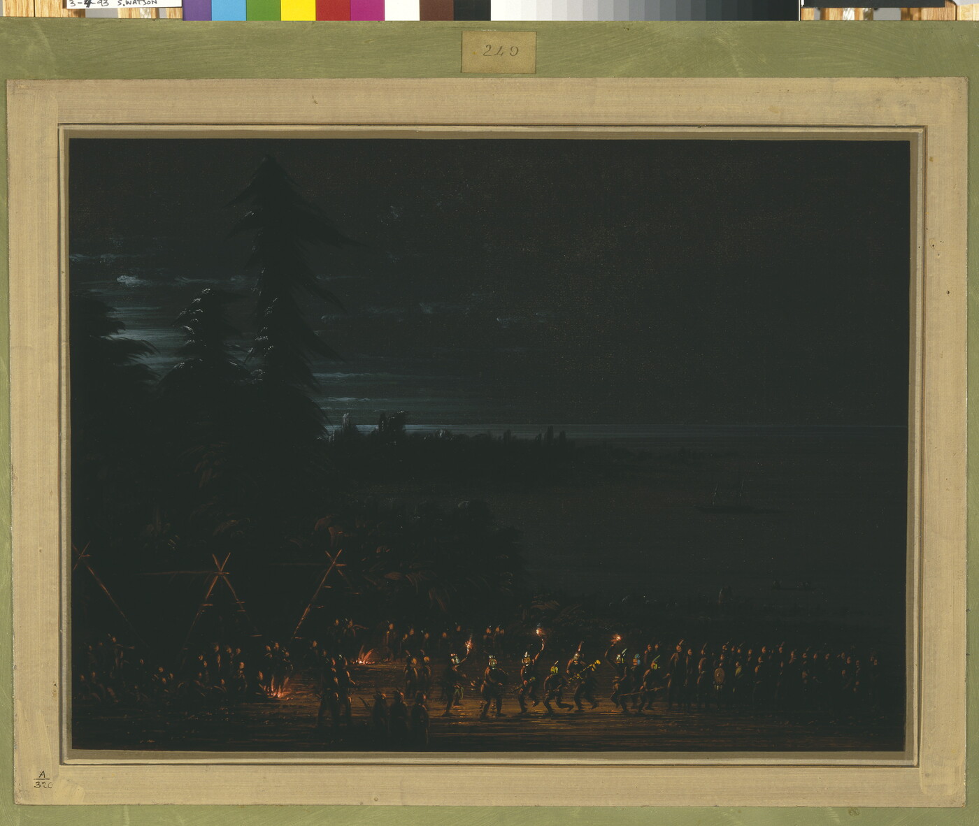 A night scene of Indigenous people gathered together for a torch-lit ceremony.