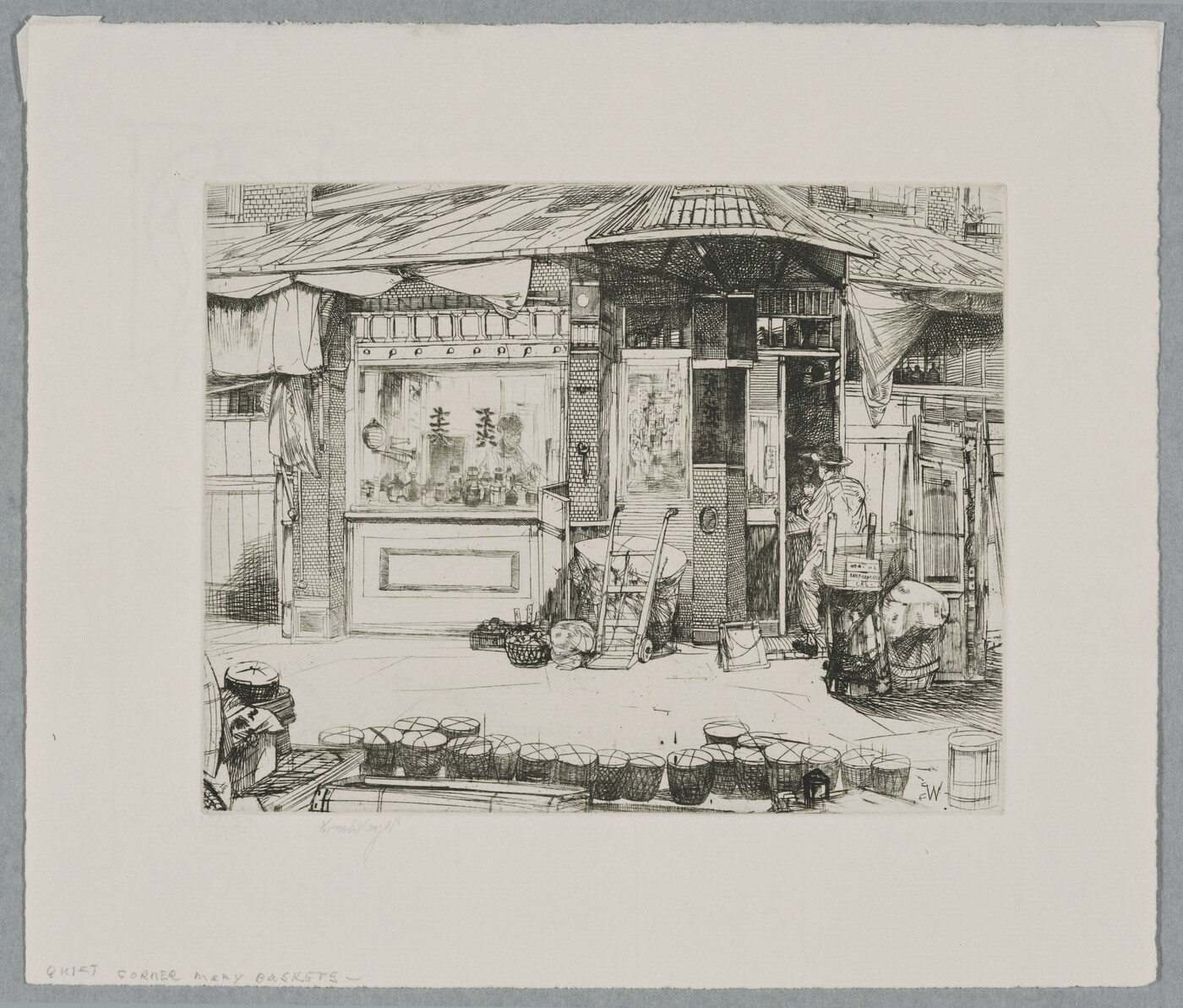 A black-and-white print of a person seated at work in front of a building with Asian details; a line of baskets on the street in the foreground.