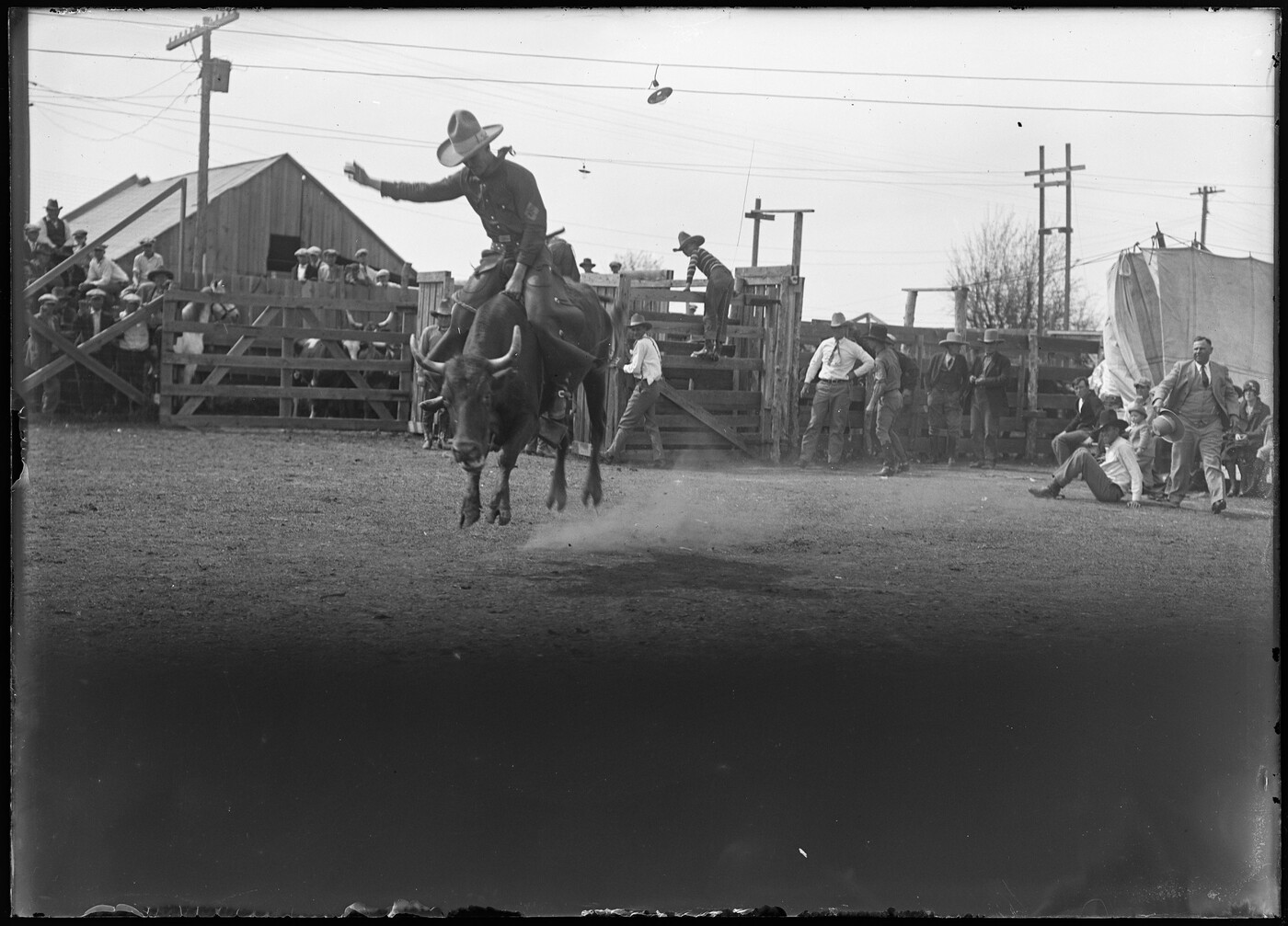 Oklahoma rodeo contestant riding a bull. Ardmore, Oklahoma. | Amon ...