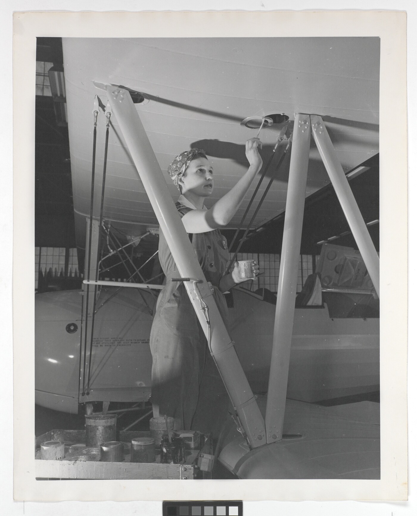 [Woman painting aircraft at Boeing plant, Wichita, Kansas] Amon Carter Museum of American Art