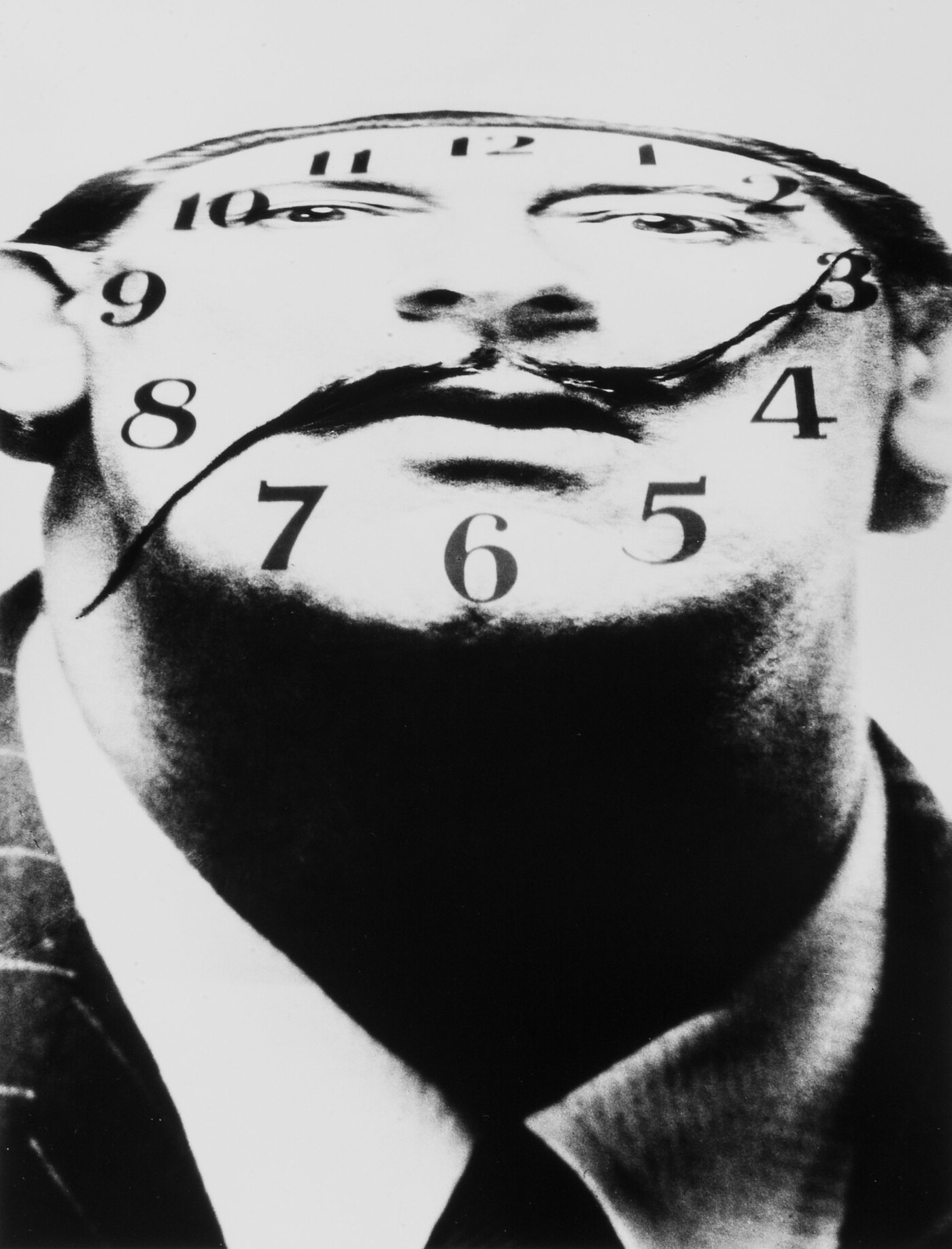 A black-and-white photograph of a White man&#039;s distorted face as a clock face with his mustache as the hands.