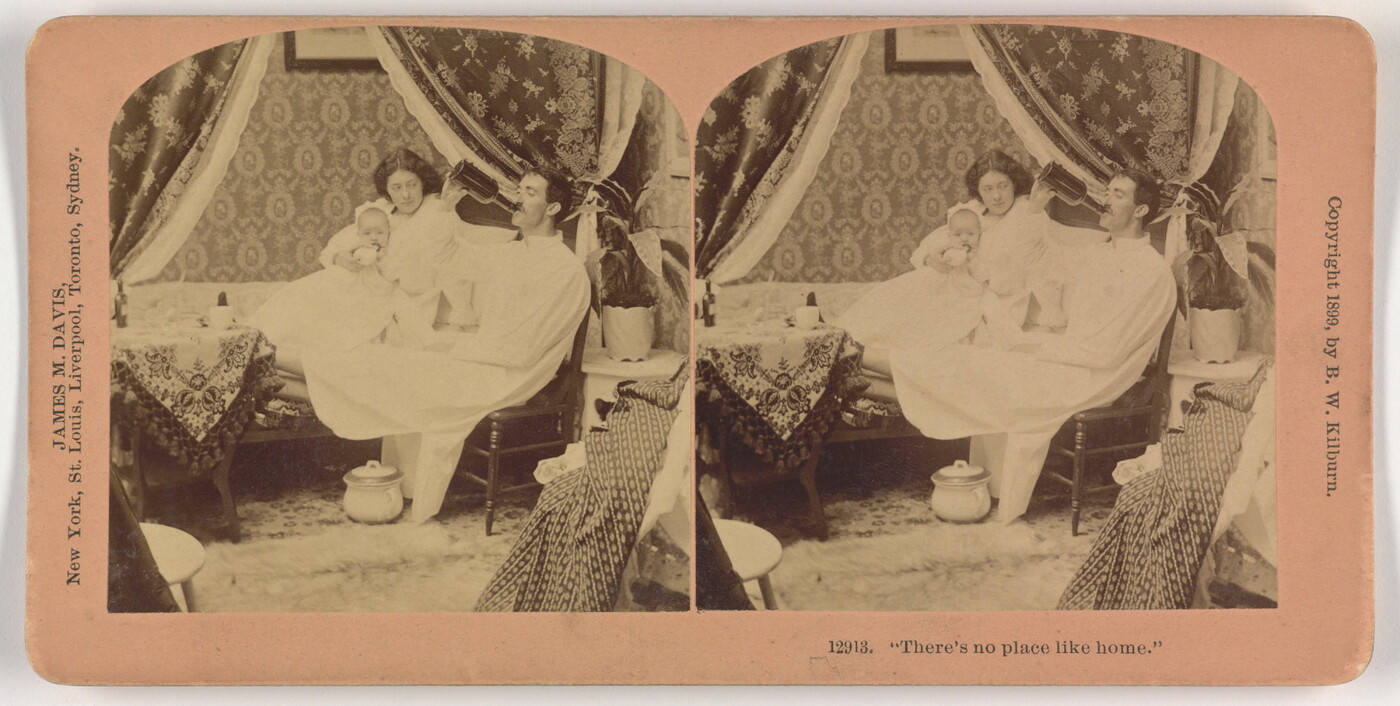 Two almost identical side-by-side sepia-toned photographs of a seated White man in a night gown drinking from a bottle and a White woman holding a baby and sitting on a bed next to him.