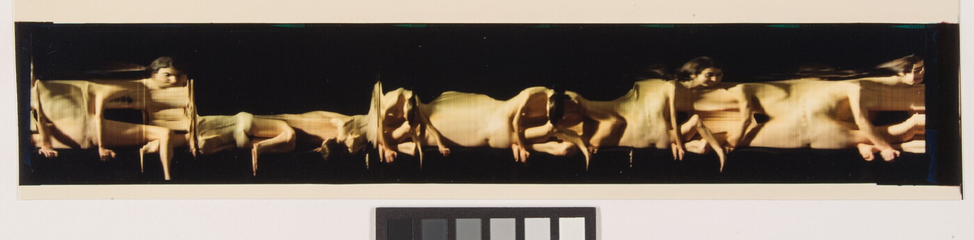 A horizontal, color photo of a nude White woman moving from position to position against a black background to create an abstract composition.