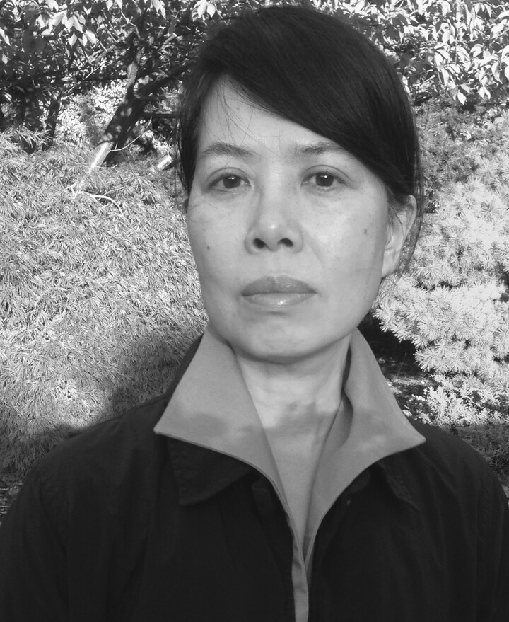Black and white headshot of photographer An-My Lê.