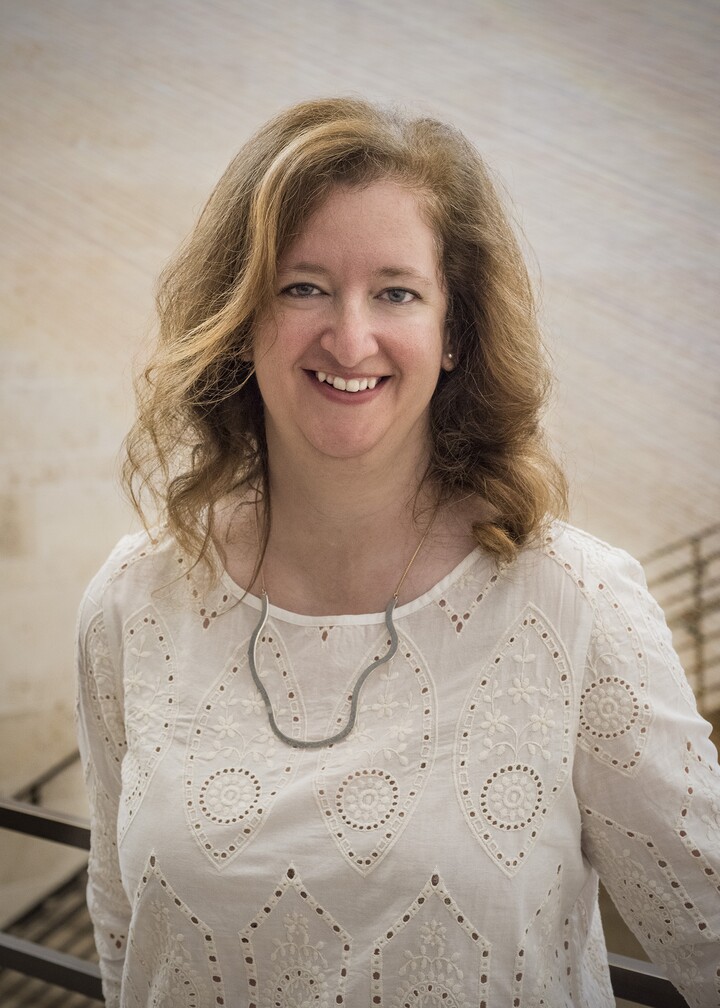 Headshot of curator Maggie Adler.
