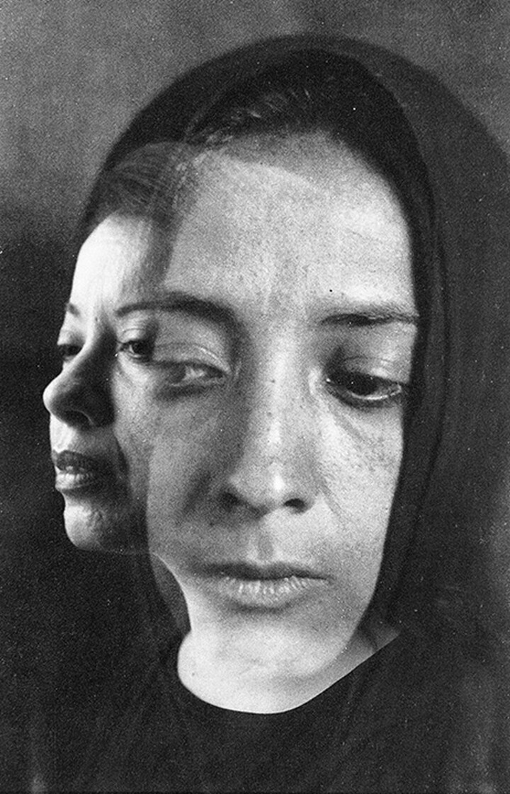 A black-and-white double exposed photograph of two women, one face on top of the other, of Mexican heritage.