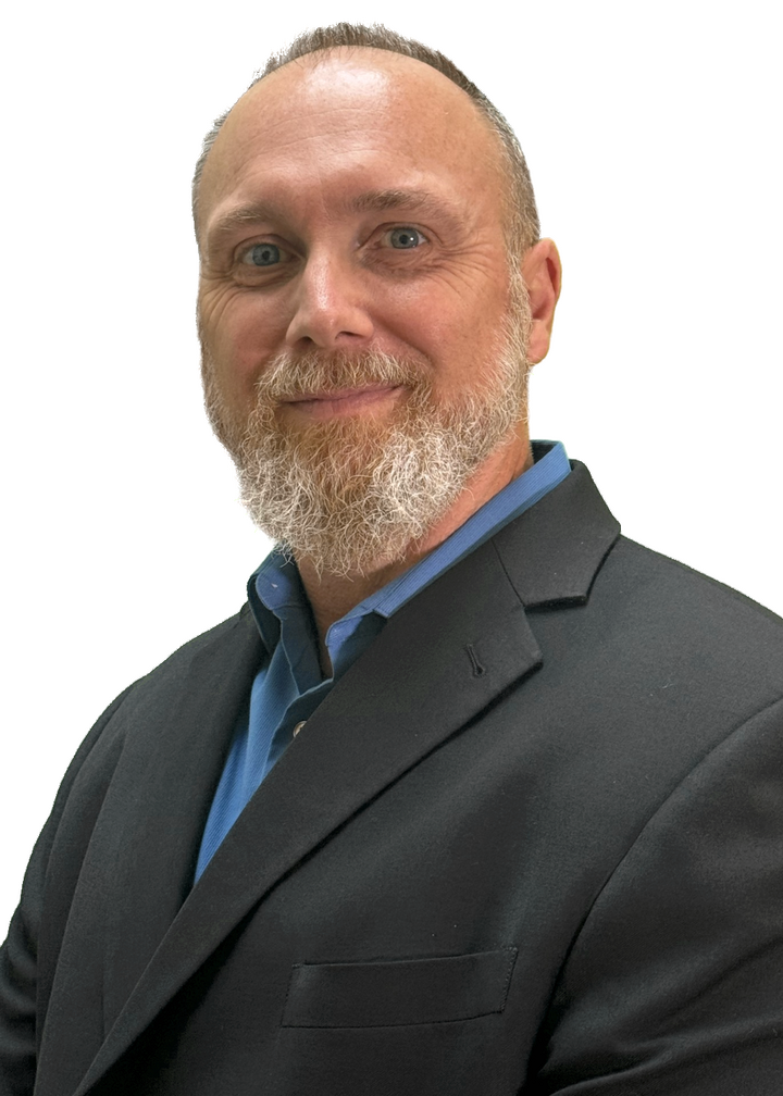 A headshot of a middle-aged White man with a beard.